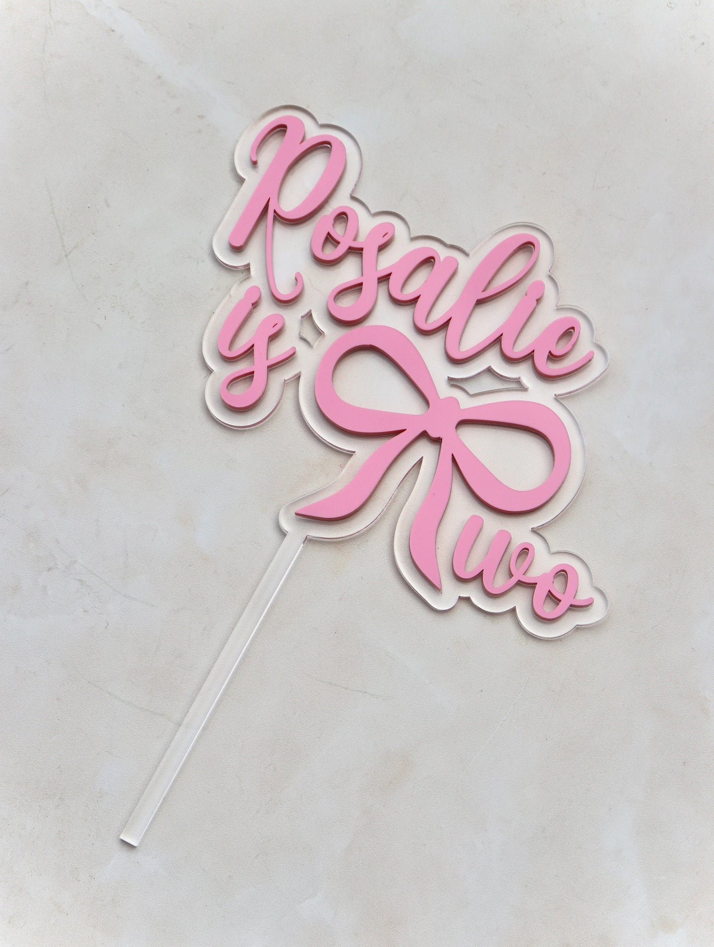 Clear & Pastel Pink Bow Cake Topper